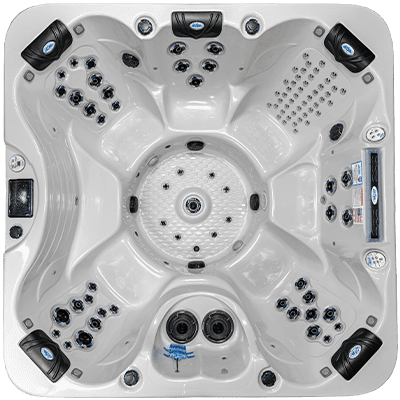 A white and black hot tub with many different controls.
